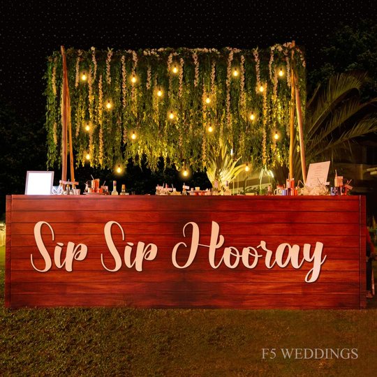 Rustic bar counter under fairy lights