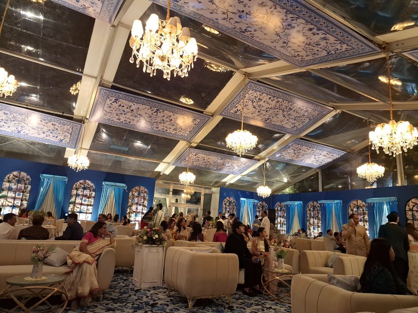 Inside a German hanger tent with chandeliers and seating