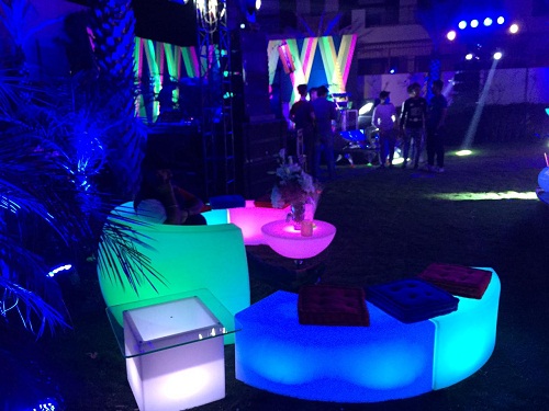 Illuminated LED seating and tables at night