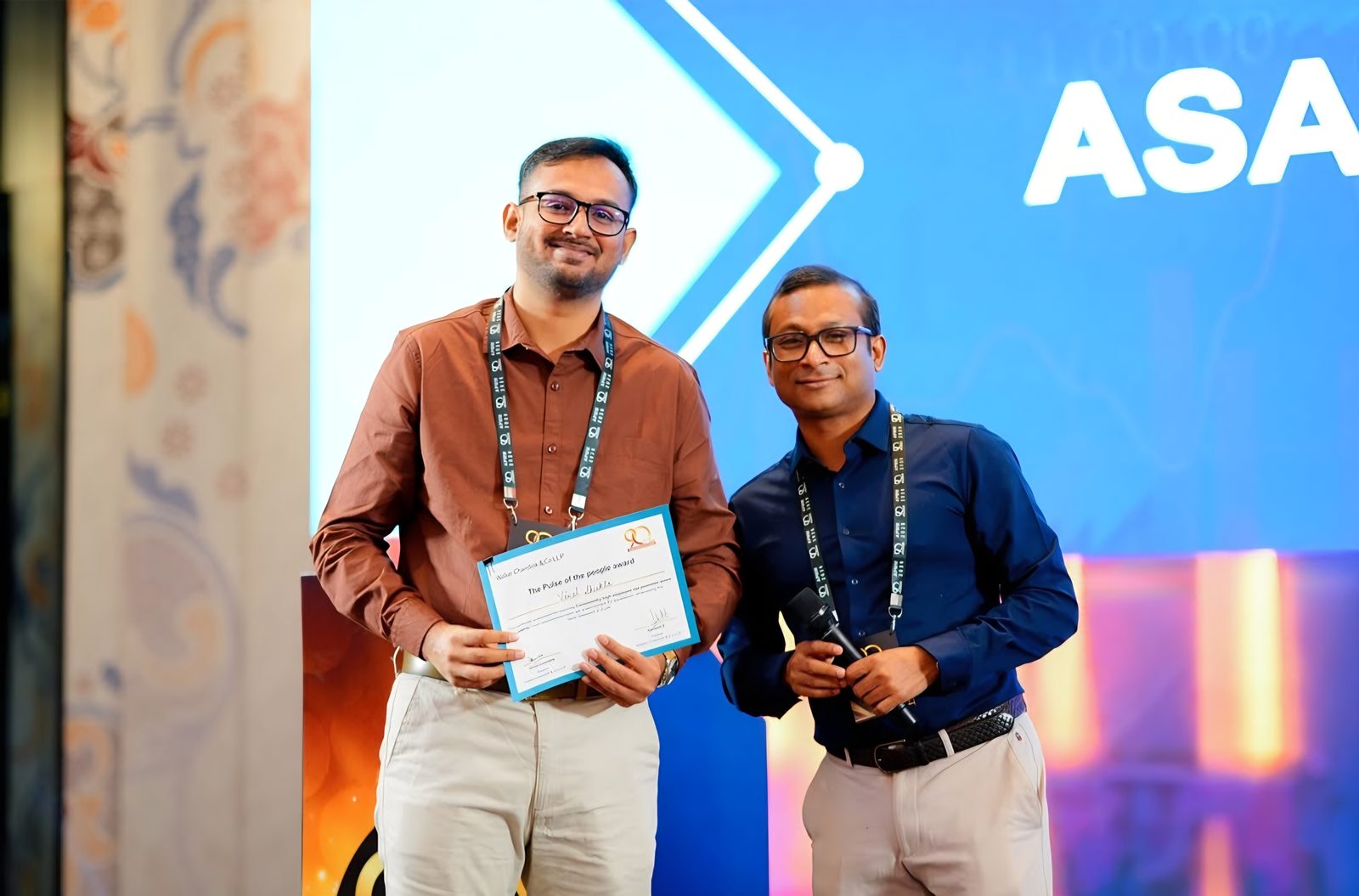 An award being handed over at a partner meet