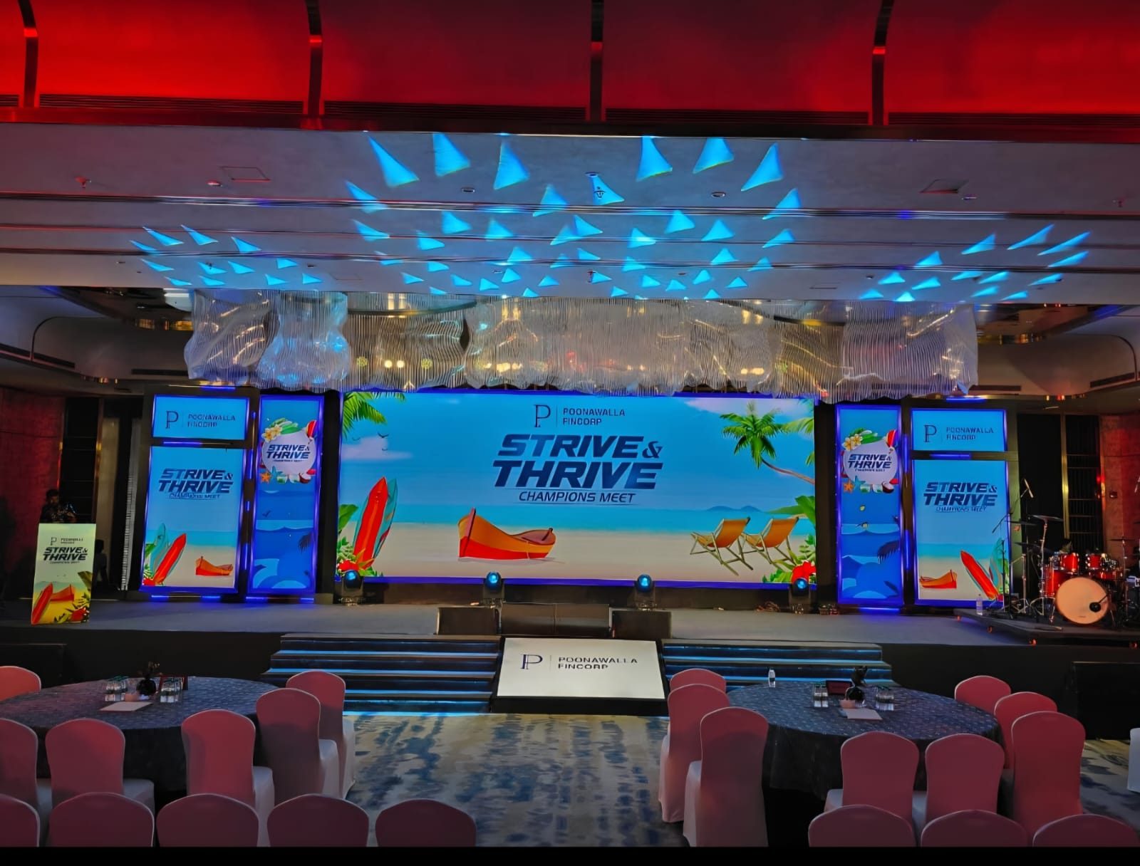 Champions meet stage with LED panels and seating