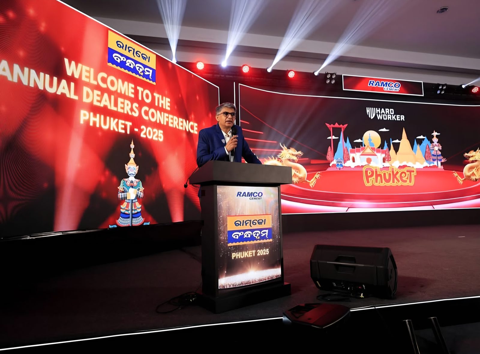 Annual dealers conference stage with a speaker at the podium