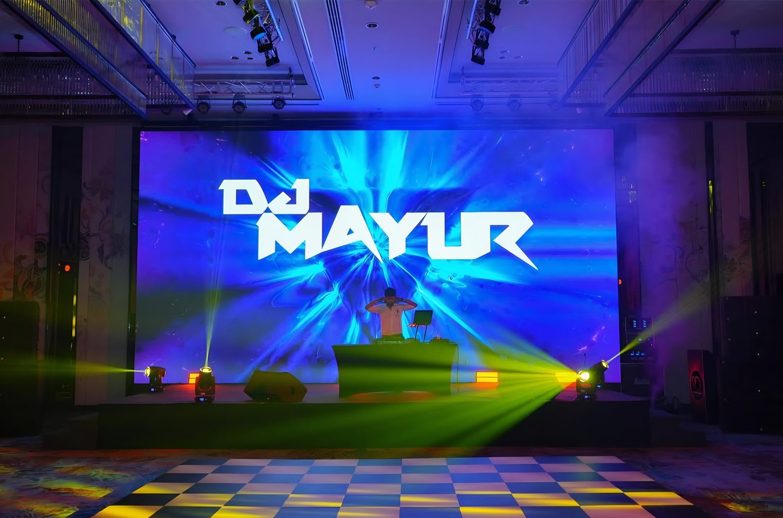 DJ console and dance floor at a corporate party
