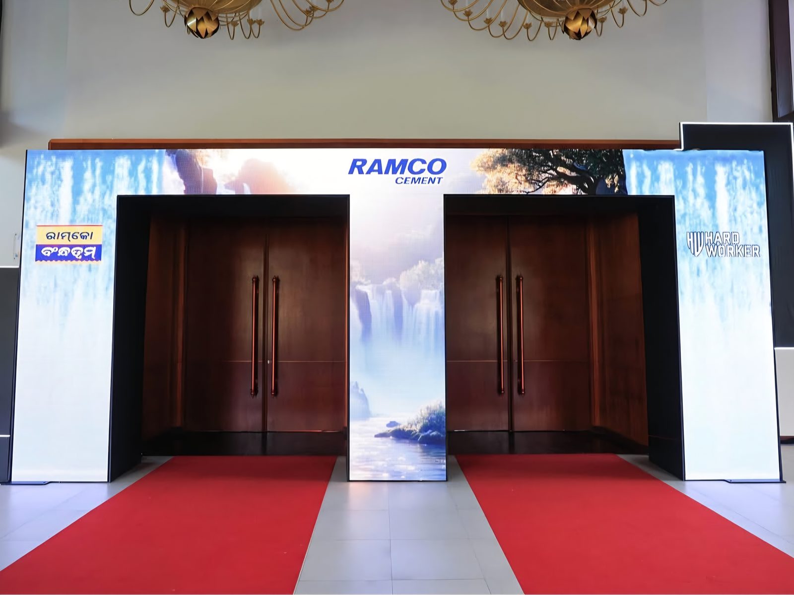 Branded entrance doors with a red carpet