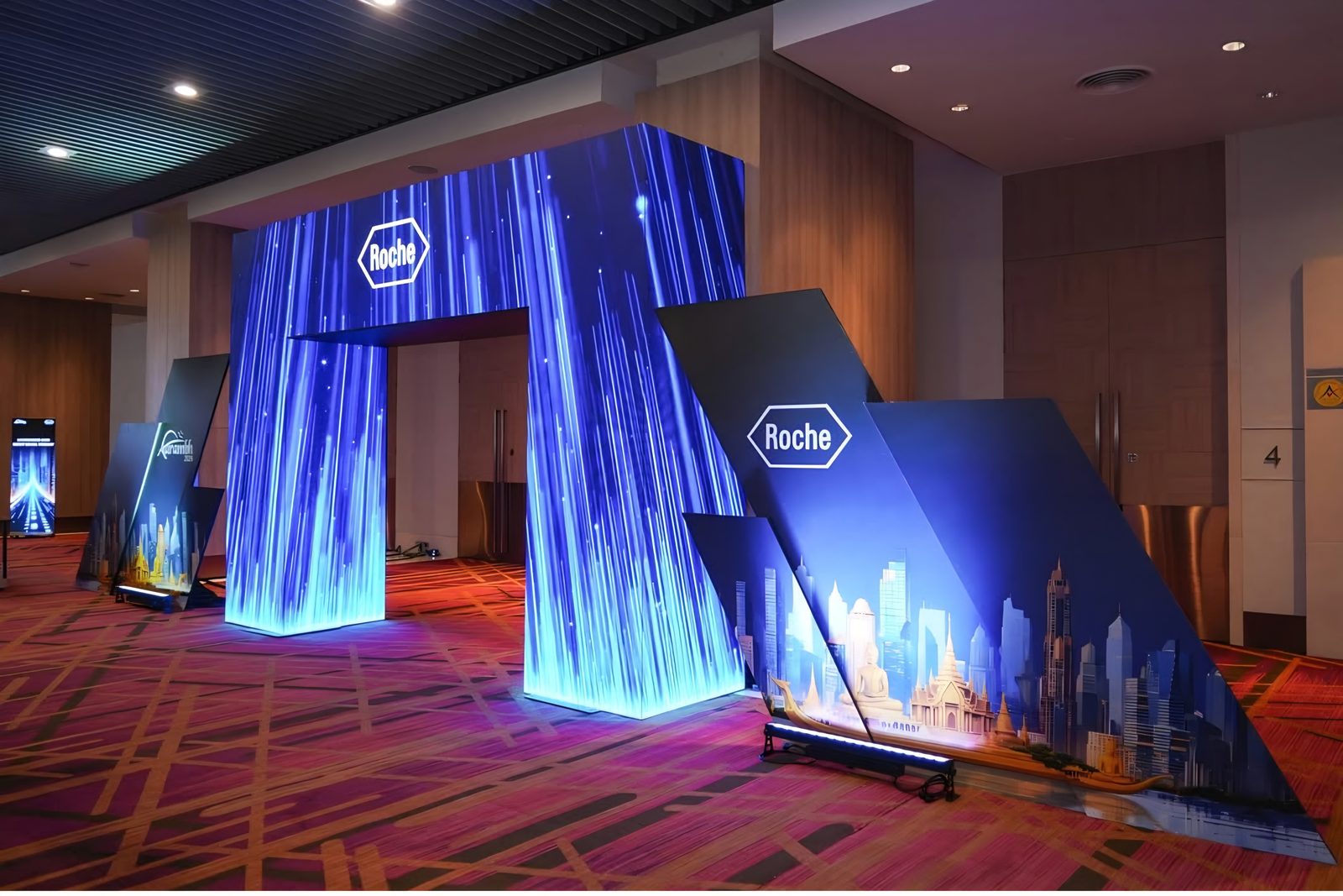 Lit entry arch into the conference hall