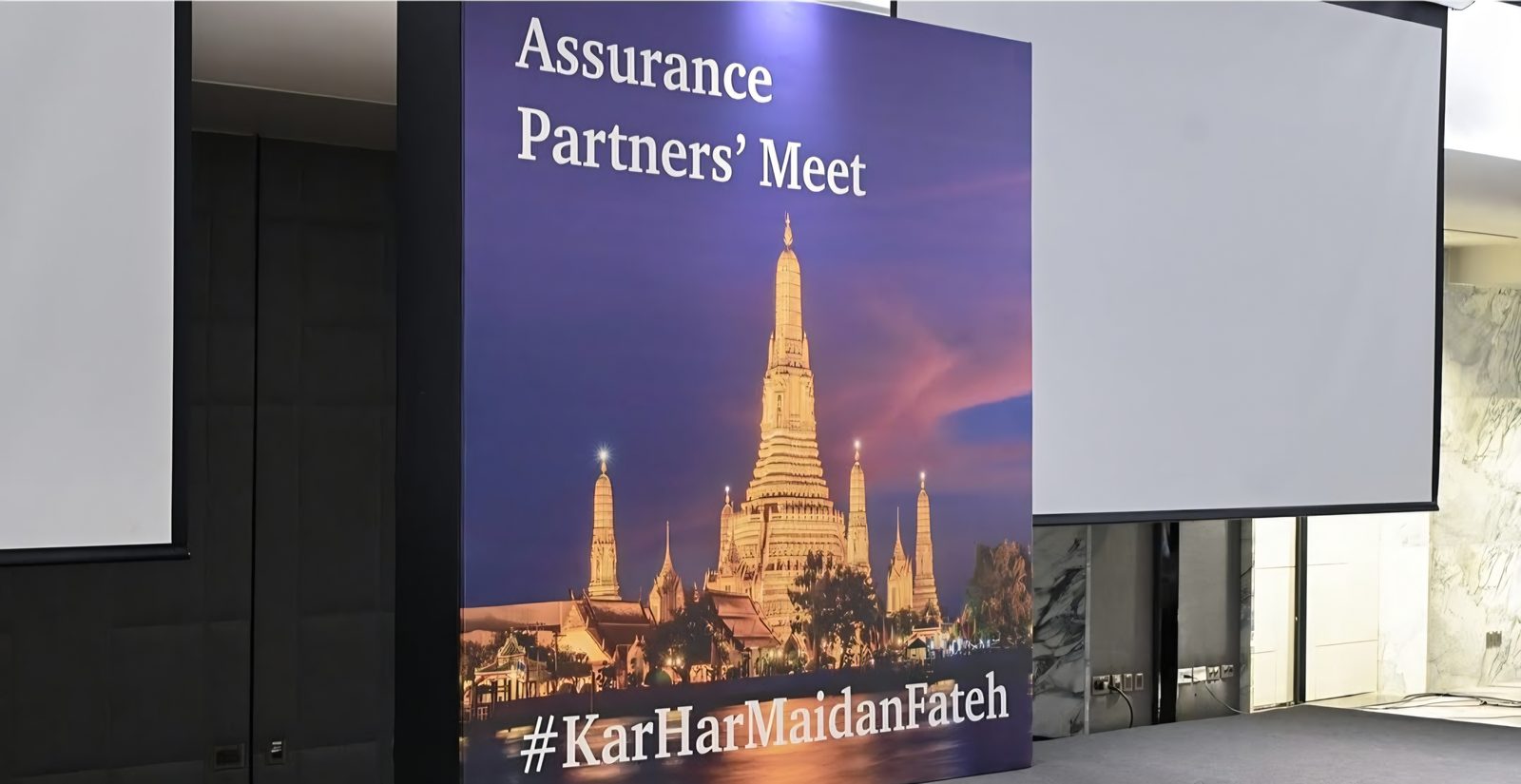 Partners meet backdrop and screens