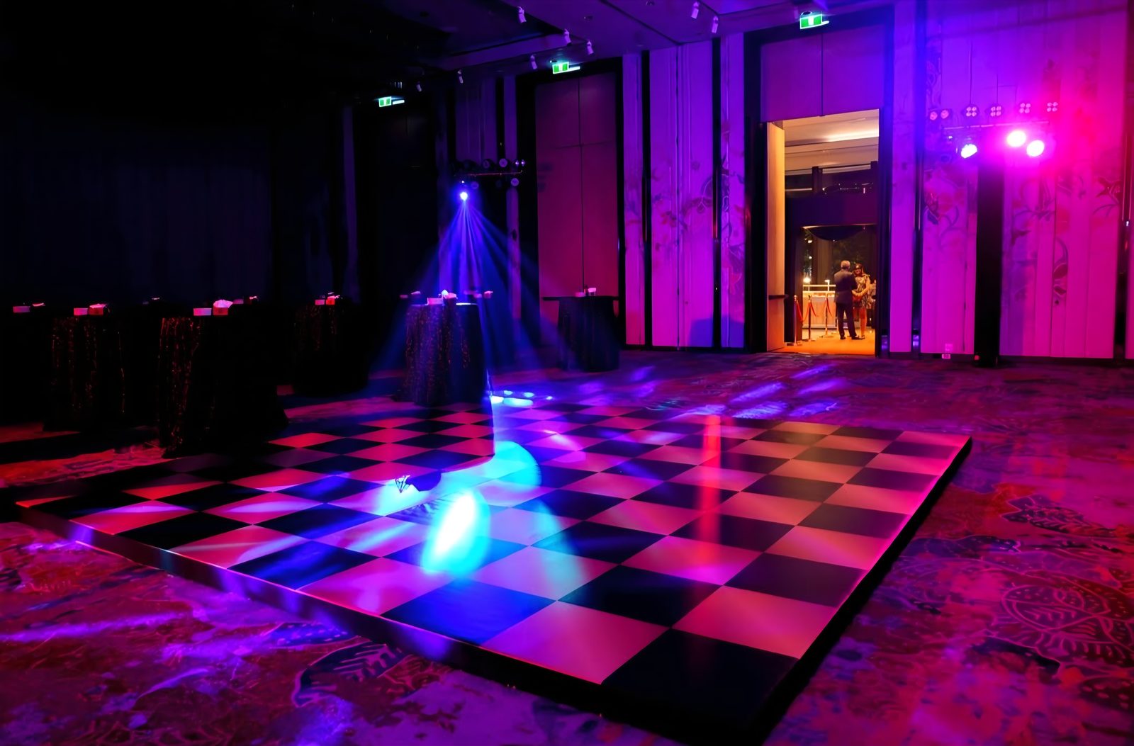 Lit dance floor at the evening party