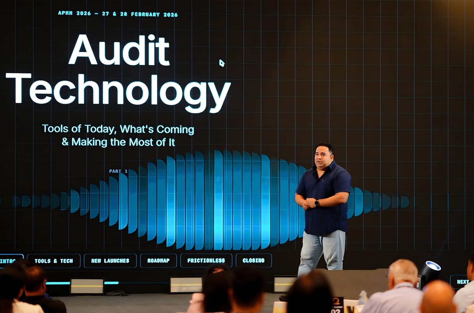 Speaker on stage during a session